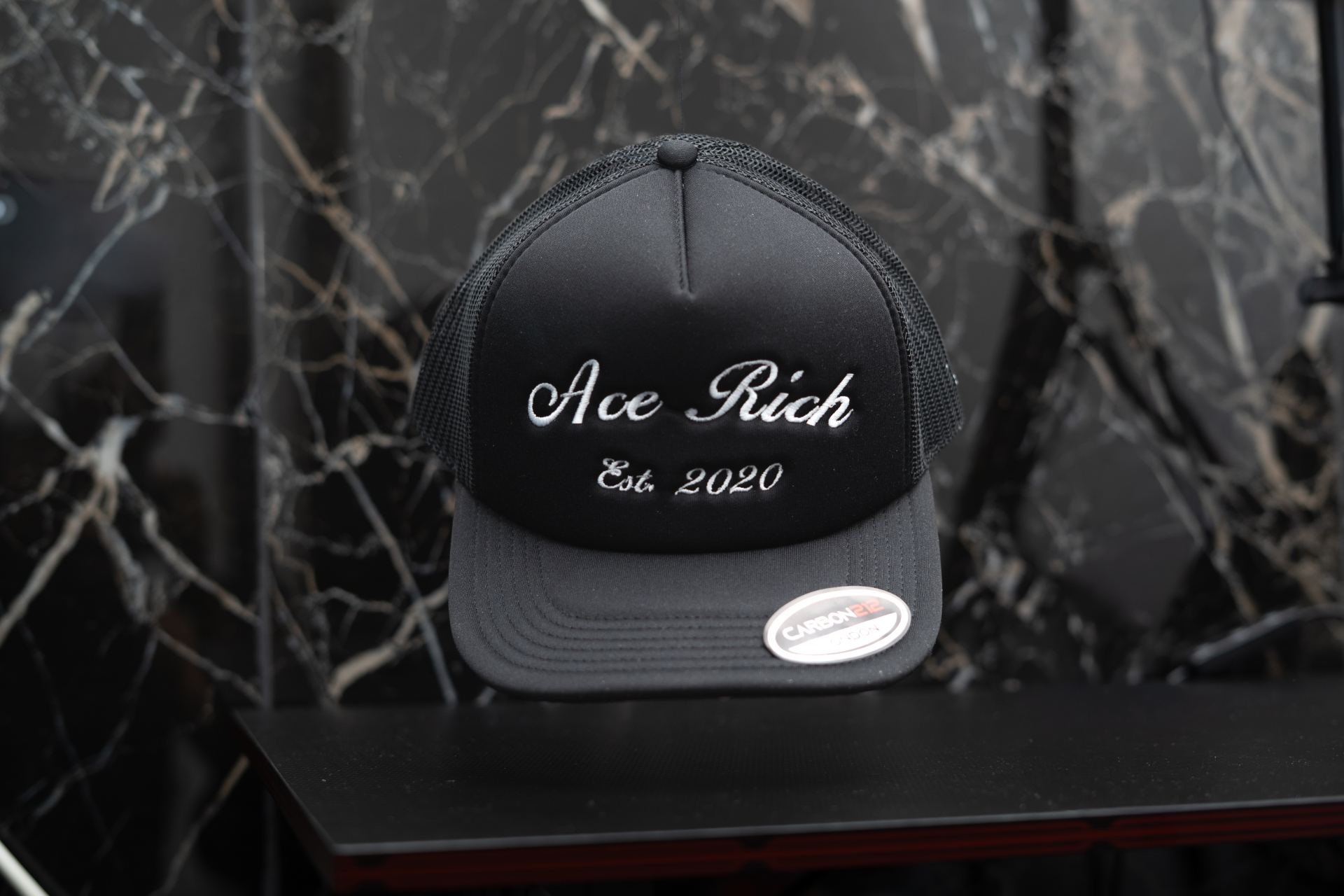 All black AceRich trucker cap